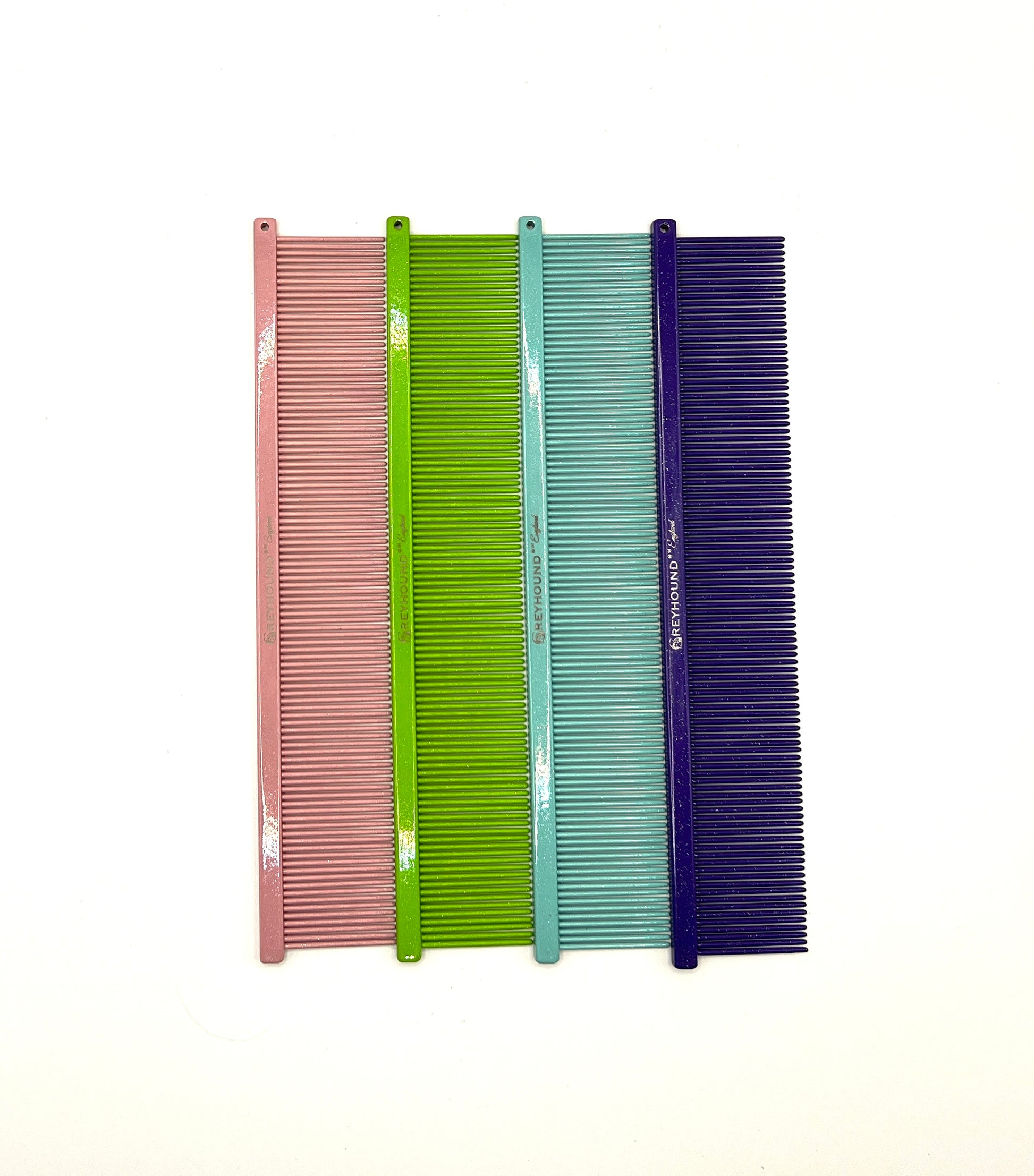 The Ashley Craig's original Greyhound Comb Finesse Collection features a 7.6"L x 1.4"W Extra Fine tine which gives superior styling control for all coat types. These versatile combs have been a staple of the pet grooming industry for over 100 years. "Sparkle" color schemes.