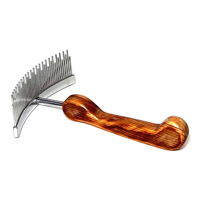 The Aaronco® Staggerd Shedder™ Professional Pet Grooming Rake is ideal for double coats. This re-interpreted classic design by industry leader Sam Kohl, helps untangle knots, remove dense undercoat, and reduce excess topcoat. Its curved stainless-steel head and blunt tines increased coat removal damaging fur or skin.