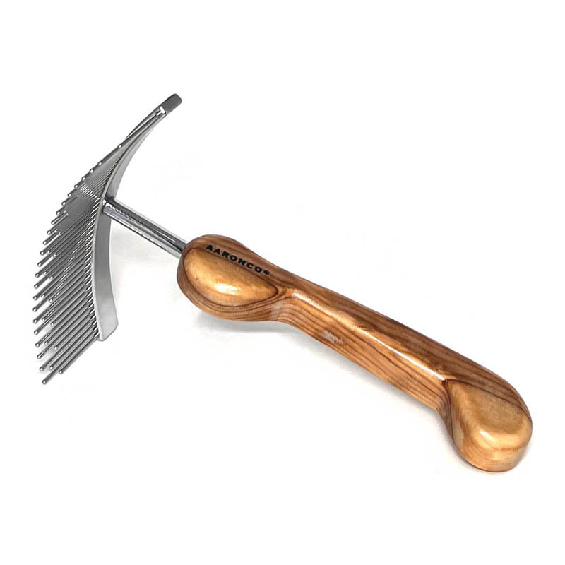 The Aaronco® Staggerd Shedder™ Professional Pet Grooming Rake is ideal for double coats. This re-interpreted classic design by industry leader Sam Kohl, helps untangle knots, remove dense undercoat, and reduce excess topcoat. Its curved stainless-steel head and blunt tines increased coat removal damaging fur or skin.
