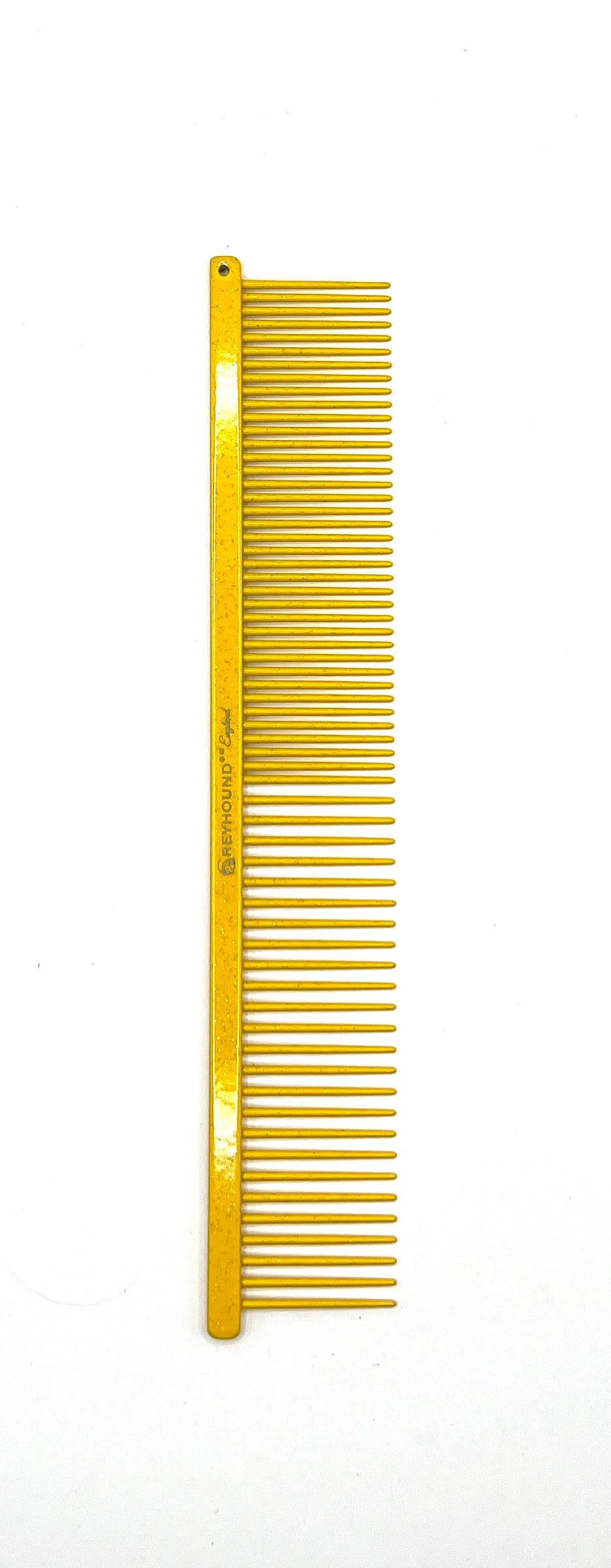 The patented Greyhound Comb Beauty Collection features a 7.6"L x 1.4"W fine to medium tine combination which gives superior styling control for all coat types. These versatile combs have been a staple of the pet grooming industry for over 100 years. Sparkle colored finish collection. Yellow.