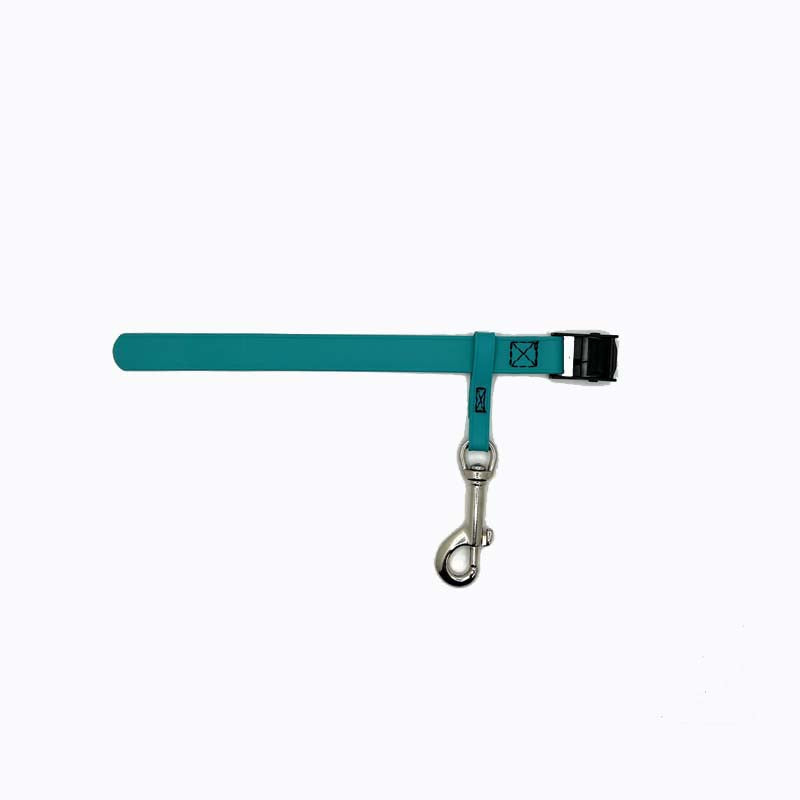 Our grooming loops safety tether is used to fit snuggly around your grooming arm and clip securely to the ring on our grooming loops. Biothane is easy to clean, odor resistant and comes in a variety of colors allowing for visual organization or a stylized workspace. Teal.