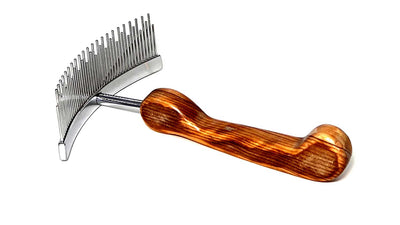 The Aaronco® Staggerd Shedder™ Professional Pet Grooming Rake is ideal for double coats. This re-interpreted classic design by industry leader Sam Kohl, helps untangle knots, remove dense undercoat, and reduce excess topcoat. Its curved stainless-steel head and blunt tines increased coat removal damaging fur or skin.