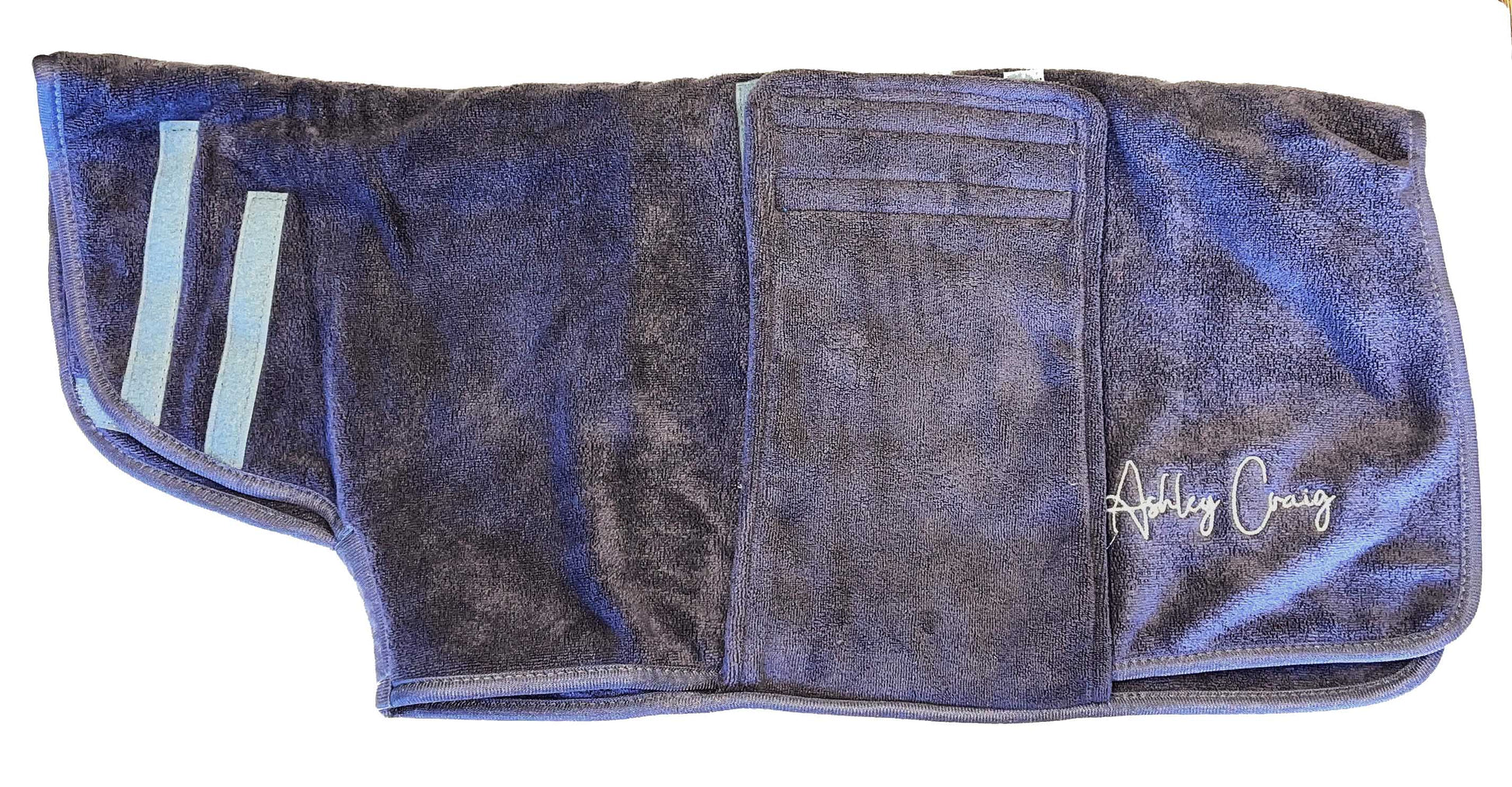 Ashley Craig has created a double-thickness velvet microfiber, pet robes which can absorb up to 50% more water than other microfiber towels, significantly reducing drying times. Ideal for preparing wire hair and flat coated breeds for show. Each robe has a secure Velcro closure and fits over the head with ease. Gray.