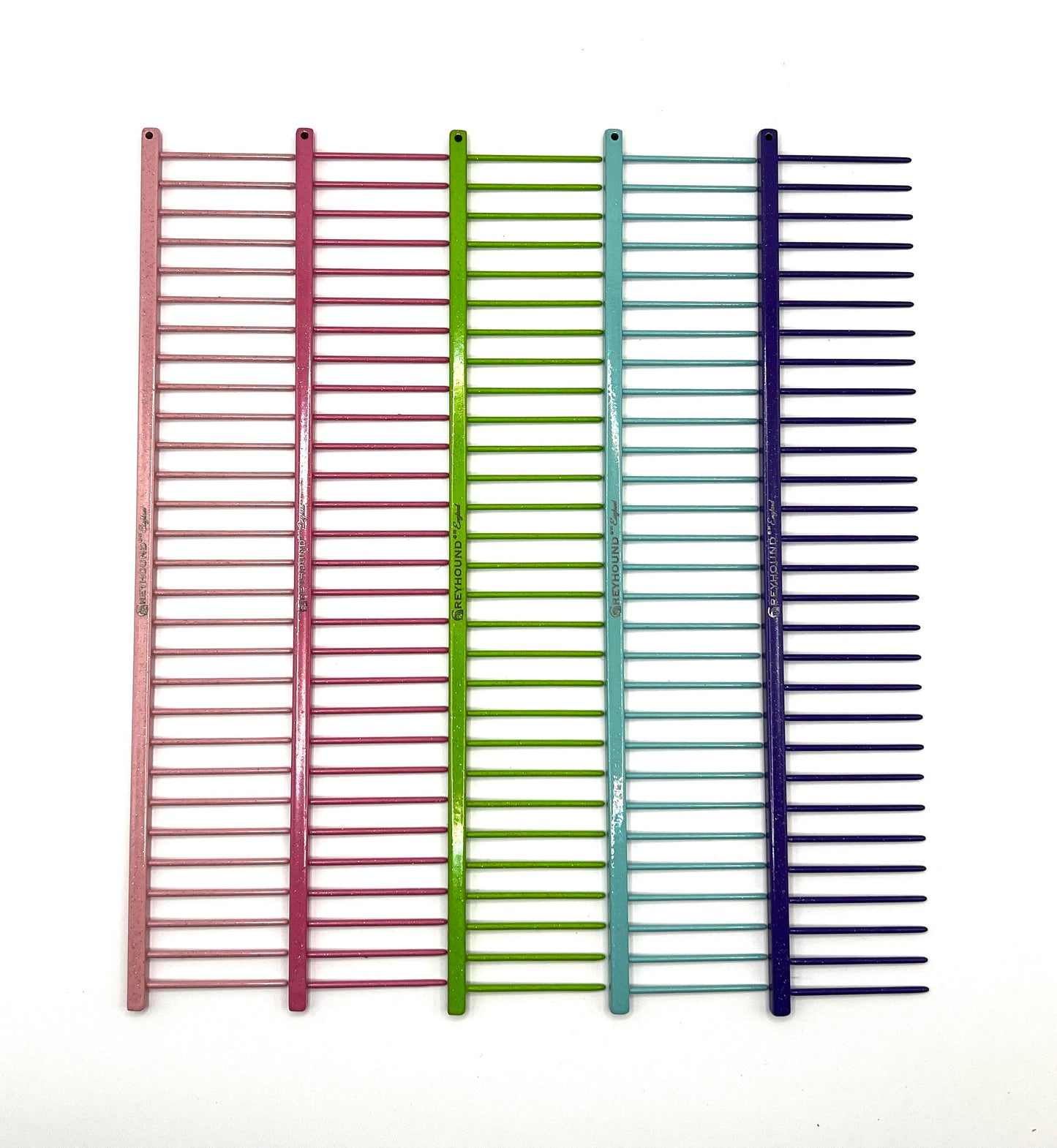 Greyhound Professional Pet Comb' Bitch Collection features a 9.875"L x 1.75"W Extra Extra Coarse tine which gives superior styling control for medium and long coat types. These versatile combs have been a staple of the pet grooming industry for over 100 years, and are available in the Sparkle Color Collection, all colors.
