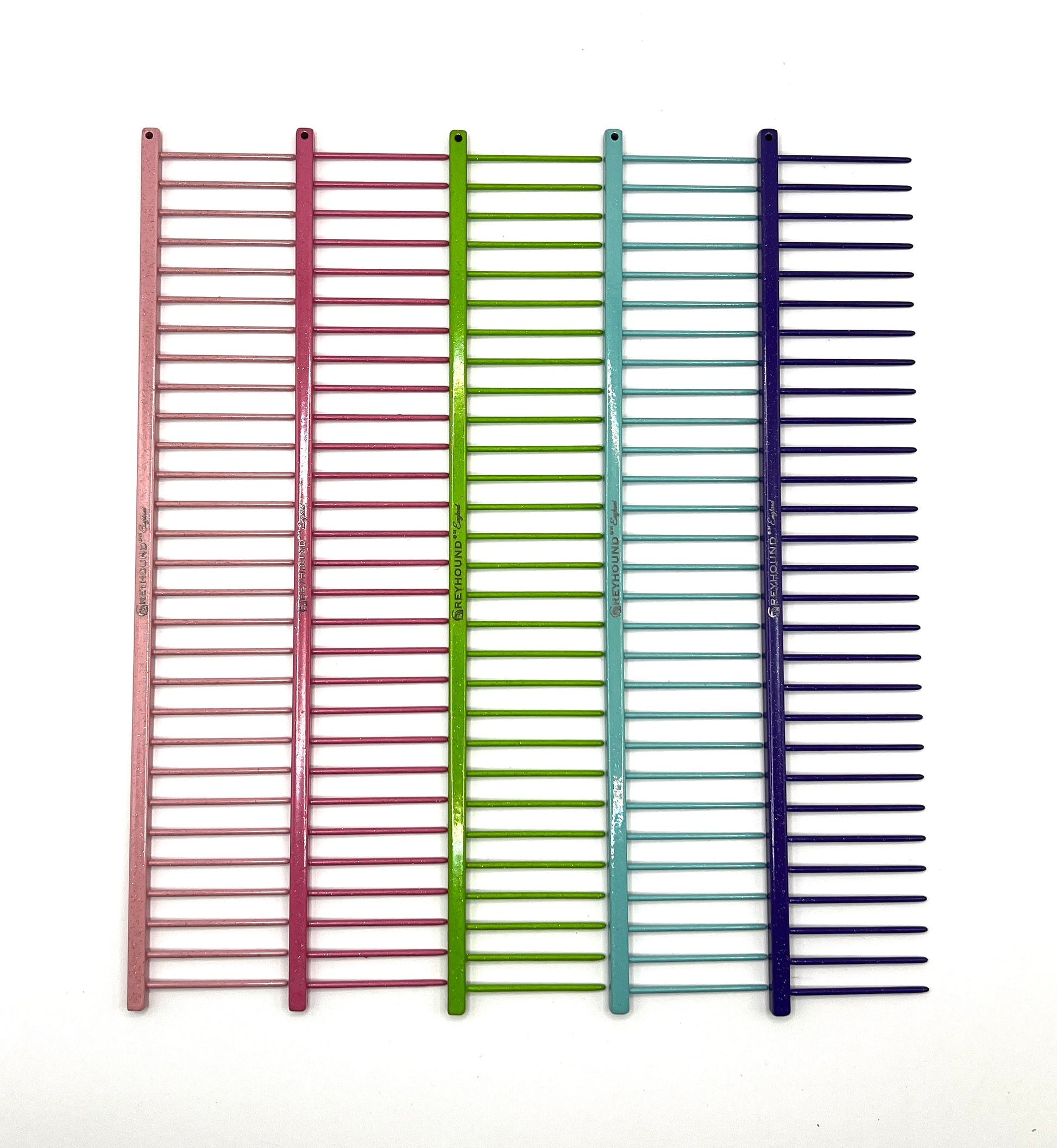 Greyhound Professional Pet Comb' Bitch Collection features a 9.875"L x 1.75"W Extra Extra Coarse tine which gives superior styling control for medium and long coat types. These versatile combs have been a staple of the pet grooming industry for over 100 years, and are available in the Sparkle Color Collection, all colors.