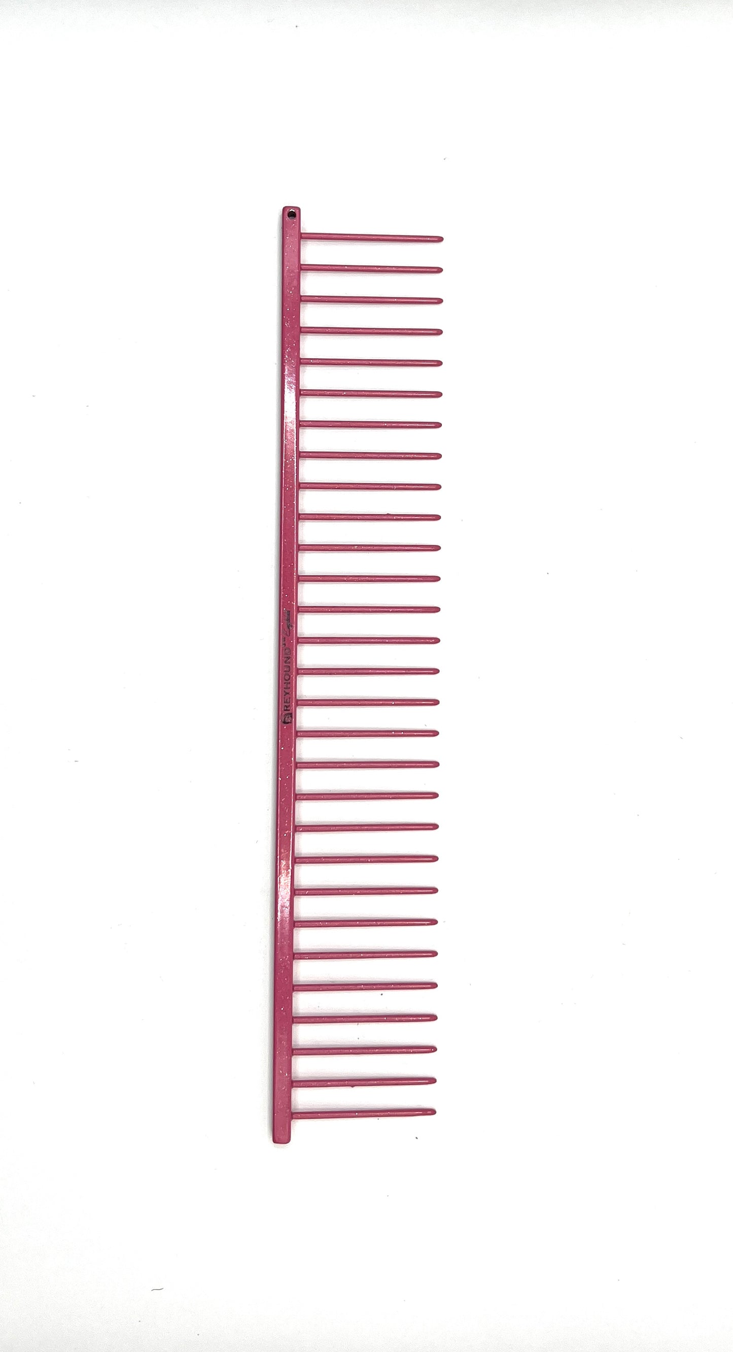 Greyhound Professional Pet Comb' Bitch Collection features a 9.875"L x 1.75"W Extra Extra Coarse tine which gives superior styling control for medium and long coat types. These versatile combs have been a staple of the pet grooming industry for over 100 years, and are available in the Sparkle Color Collection, Lipstick Pink Sparkle.