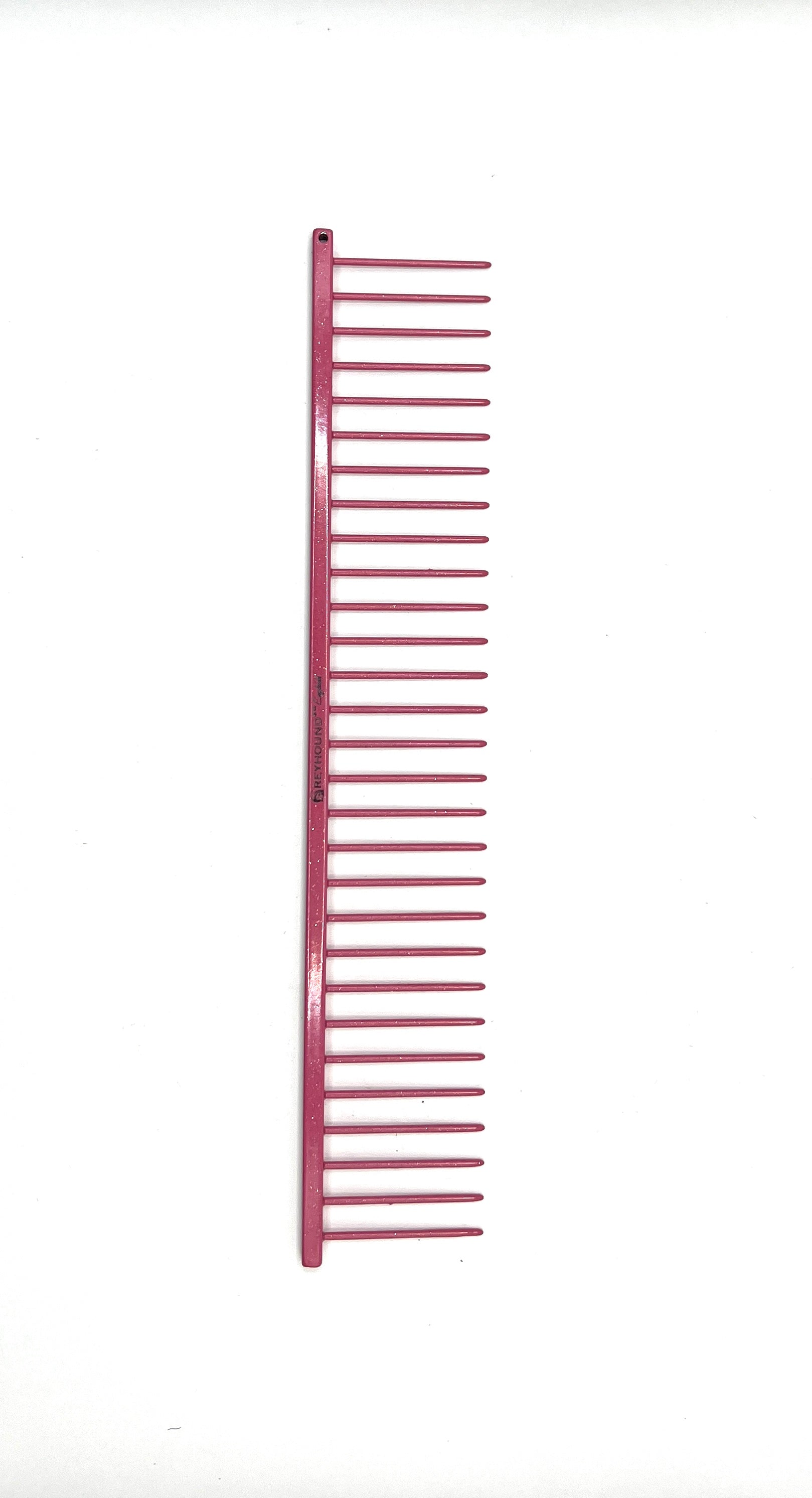 Greyhound Professional Pet Comb' Bitch Collection features a 9.875"L x 1.75"W Extra Extra Coarse tine which gives superior styling control for medium and long coat types. These versatile combs have been a staple of the pet grooming industry for over 100 years, and are available in the Sparkle Color Collection, Lipstick Pink Sparkle.