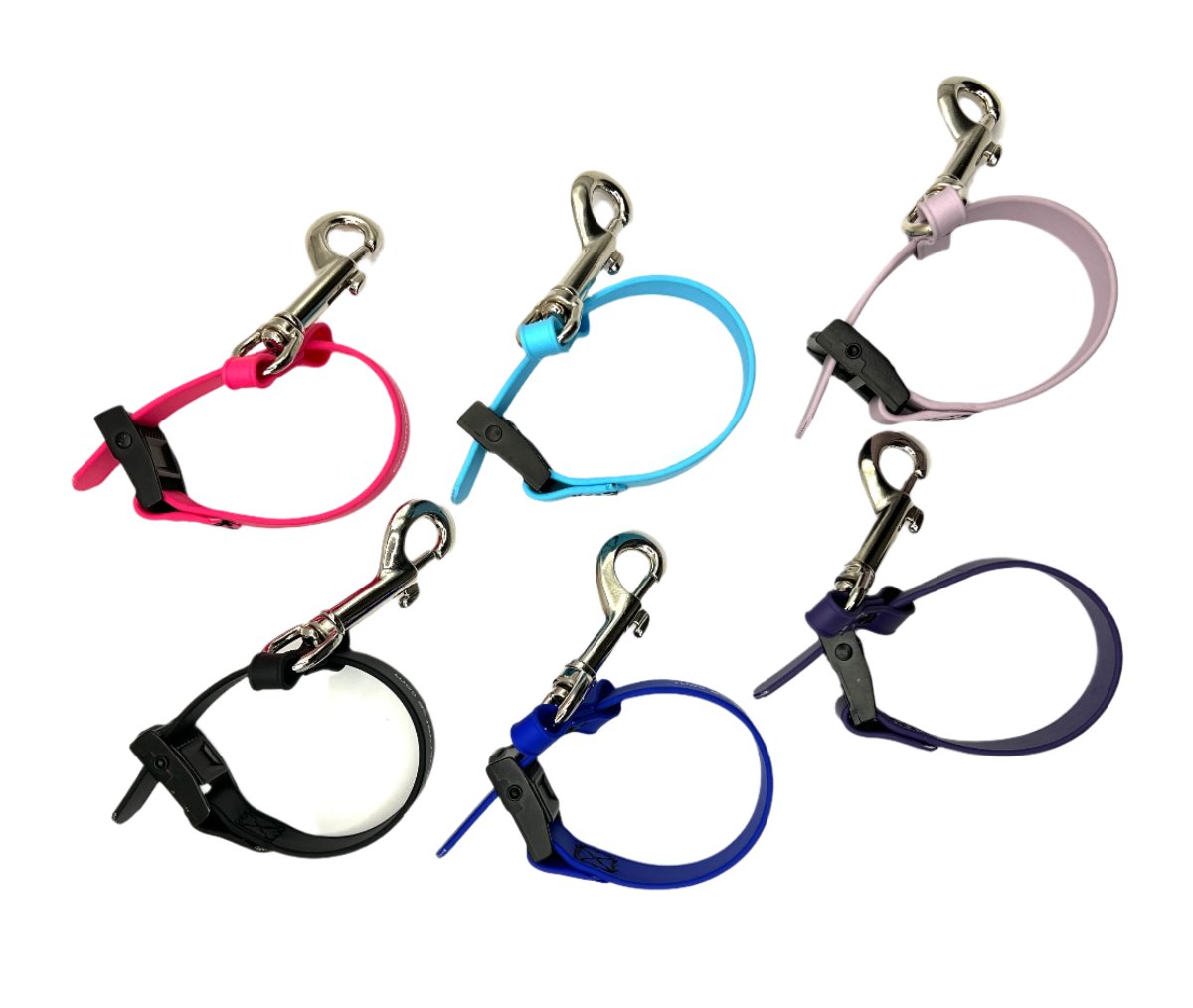Our water proof, odor resistant USA Made Biothane pet safety tethers fit snuggly around table arms and clip securely to the ring on our Biothane grooming loops. Available in 6 Colors.