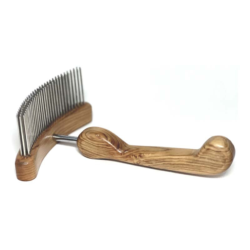 The Aaronco® Undercoat'R™ Professional Pet Grooming Rake is ideal with medium to long double coats. Designed by industry leader Sam Kohl, it untangle knots, remove dense undercoat and reduce excess topcoat. Its curved stainless steel head and blunt tines offer increased coat removal without damageing the fur or skin.