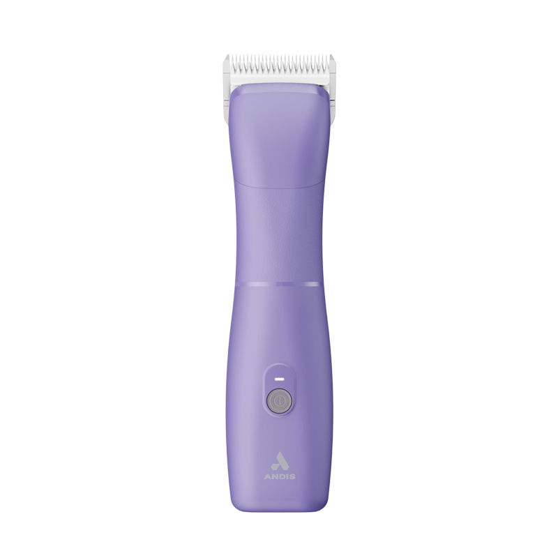 The new Andis eMERGE™ professional pet clipper in light purple was designed for groomers who need and want high speed and power. This single-speed clipper will cut through any coat. The powerful rotary motor achieves 4500 SPM and works with a detachable blade system with wide compatibility make maintenance a breeze. The cord/cordless flexibility and shape with a contoured body and finger grooves helps increase control and reduce hand strain. Top view.