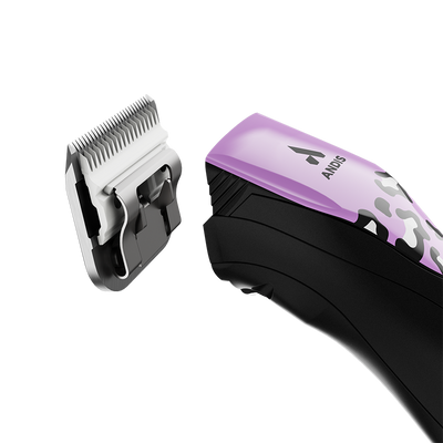 The Andis Gabriel Feitosa inspired limited addition, Pulse ZR II colorway Wild, cordless professional pet clipper now deliver up to 3 hours of run time on a single charge and works with swappable, rechargeable batteries so there is not a halt in styling. The Pulse ZR II has a powerful rotary motor with 5 speeds that achieve 2,500-2,400 spm and includes the detachable blade system and wide compatibility make maintenance a breeze. Side view.