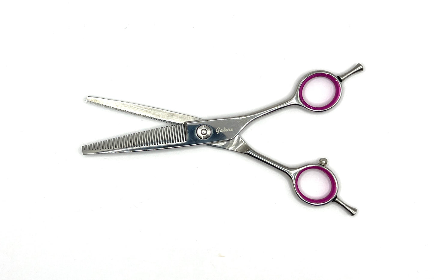 The Gator Series is an entry level collection made from a high-quality stainless steel alloy that allows for a razor-sharp edge and are specifically designed for cutting and finishing all types of coats. Combined with a ball bearing pivot with tension balancing spring , these shears are precisely weighted and honed to a razor-sharp edge for effortless scissoring, balance, and comfort. The ergonomic handles and fixed finger rest help prevent hand and wrist fatigue. 6.5"-40Tooth Dbl blender open.