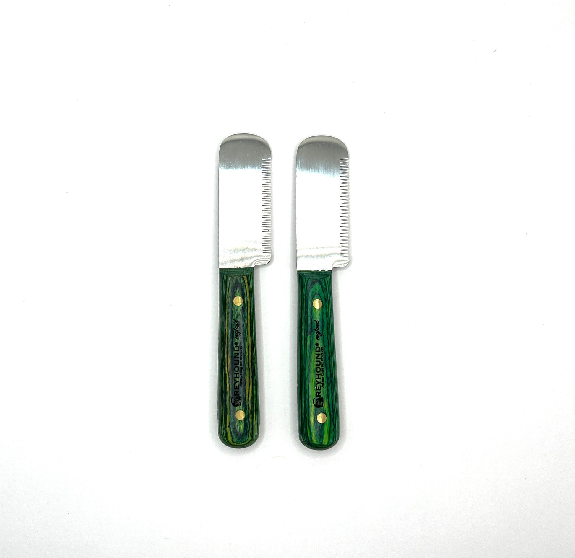 These larger grip handled carding tools by Greyhound were designed for comfort and to lessen hand fatigue. The larger blade works well to card coarser coat while the finer tool grips more coat. The ergonomic wood handle is created to maximize comfort with a smooth finish wrapped around 3 sides. Comes in Right or Left Handed styles. Left Handed Set.
