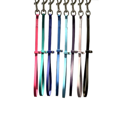 These patent pending grooming loops are 18" long and made from USA manufactured and produced heavy duty BioThane Beta 520. This durable, non-porous material is ideal for long lasting, odor free grooming equipment. The polyester nylon webbing core covered with a TPU coating, making it strong and flexible. Heavy stitching allows for the material to hold up to all types of tugging. All Colors.