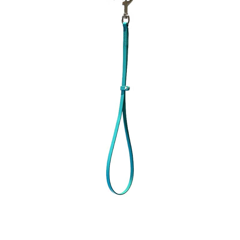 These patent pending grooming loops are 16" long and made from USA manufactured and produced heavy duty BioThane Beta 520. This durable, non-porous material is ideal for long lasting, odor free grooming equipment. The polyester nylon webbing core covered with a TPU coating, making it strong and flexible. Heavy stitching allows for the material to hold up to all types of tugging. Teal.