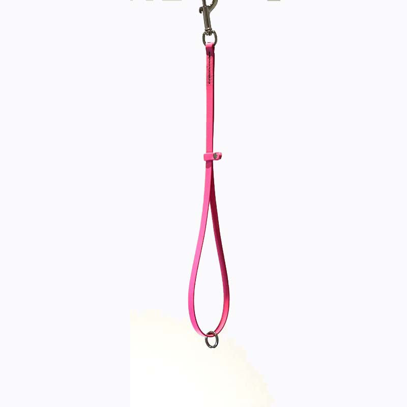 Groomerverse 18" grooming loops with an additional safety ring are perfect for table to tub use. The safety ring allows for the loop to be attached to our biothane safety tether.  Avoid having to work with several different styles of loops. Biothane is easy to clean, odor resistant and comes in a variety of colors allowing for visual organization or a stylized workspace.  Neon Pink.