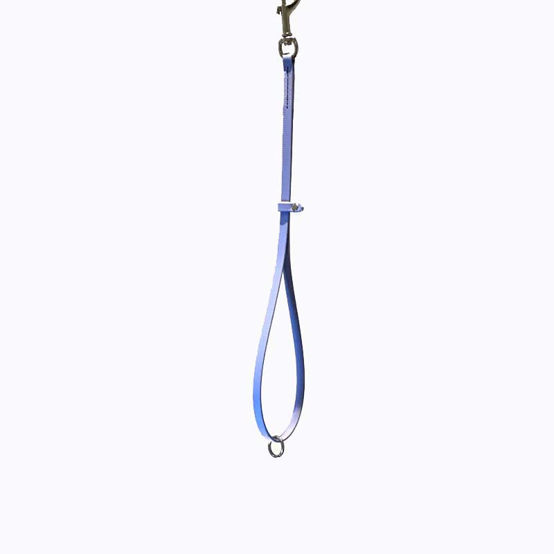Groomerverse 18" grooming loops with an additional safety ring are perfect for table to tub use. The safety ring allows for the loop to be attached to our biothane safety tether.  Avoid having to work with several different styles of loops. Biothane is easy to clean, odor resistant and comes in a variety of colors allowing for visual organization or a stylized workspace. Periwinkle.
