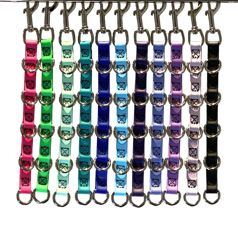 Groomerverse water proof grooming loop extenders are made from USA manufactured and produced heavy duty BioThane Beta 520. This durable, non-porous material is ideal for long lasting, odor free grooming equipment. It is made from a polyester nylon webbing core covered with a TPU coating, making it strong and flexible.  All Colors shown.