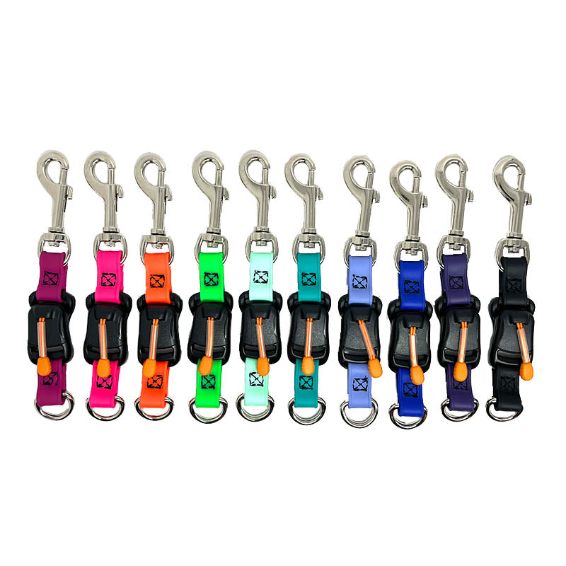 Our 6" grooming emergency safety quick release has a unique magnetic side safety lock with a pull tab release and swivel clasp perfect for table to tub use. This new safety quick release can be attached to grooming loops, belly bands and any other table safety tether used. All are made with Biothane which is easy to clean, odor resistant and comes in a variety of colors allowing for visual organization or a stylized workspace. All Colors.