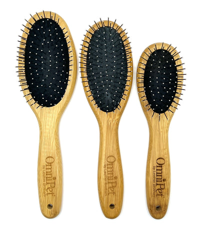 Pro-Finish™ Pin Brushes are constructed from light weight, natural bamboo that is more water resistant then wood products. The rounded metal tip pins medium spaced and prevent brush burn. These type of brushes work great for dogs with long coats or wire coats to smooth the hair, remove dirt and help with loose tangles. are easy to keep clean and stay more rigid; lift and removal dander and loose coat. All Sizes.
